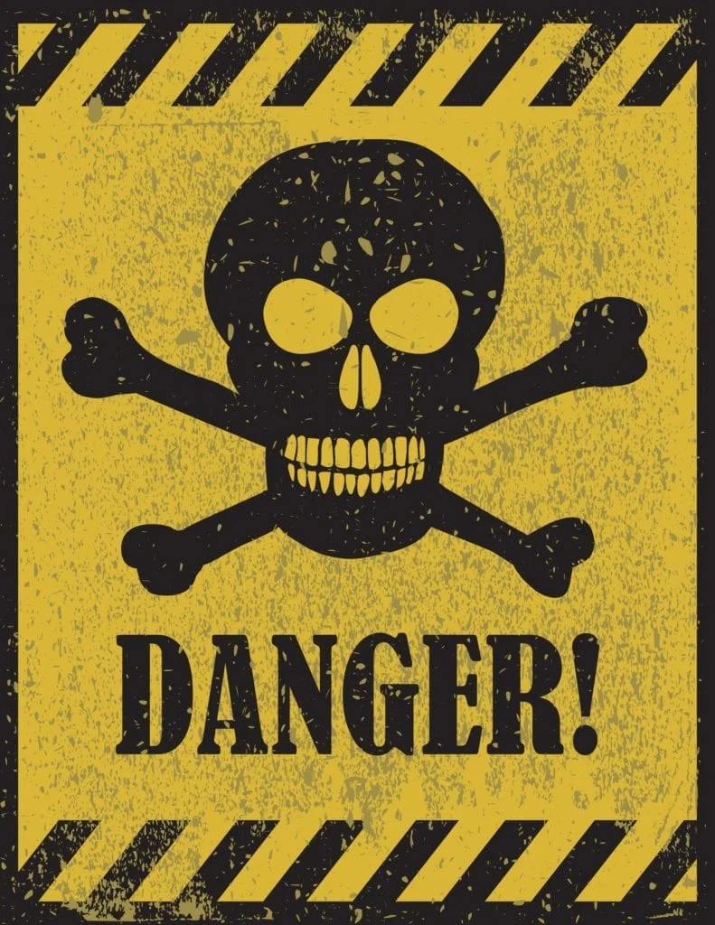 Signe de danger crâne et os croisés Le manque de sécurité du fluorure en fait un signe de danger pour la santé humaine